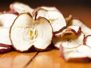 قیمت سیب خشک با پوست + مشخصات بسته بندی عمده و ارزان